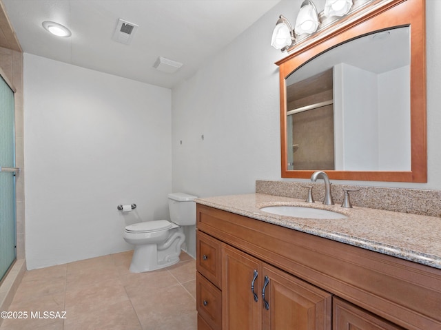 2638 N Wilson Ave, Tucson, AZ 85719 - full bath with vanity, a shower stall, and tile patterned flooring