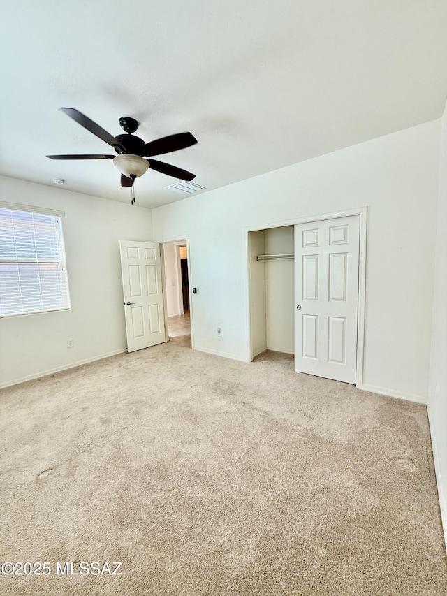 8361 N Mountain Stone Pine Way, Tucson, AZ 85743 - unfurnished bedroom featuring carpet floors, a closet, and a ceiling fan