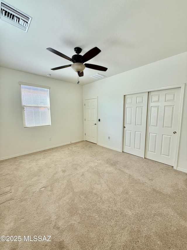 8361 N Mountain Stone Pine Way, Tucson, AZ 85743 - unfurnished bedroom featuring carpet floors, a closet, and a ceiling fan