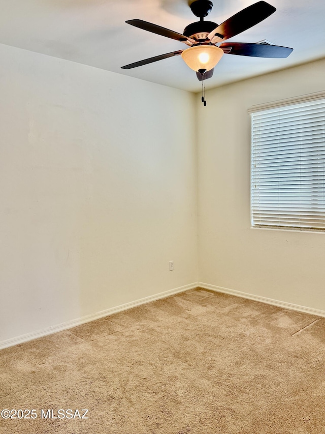 8361 N Mountain Stone Pine Way, Tucson, AZ 85743 - carpeted spare room featuring ceiling fan and baseboards