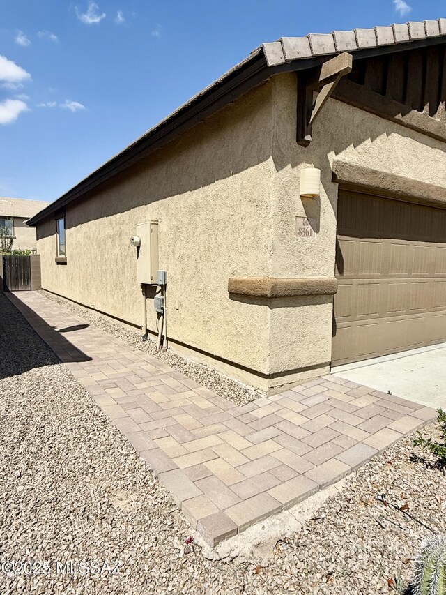 8361 N Mountain Stone Pine Way, Tucson, AZ 85743 - view of home's exterior with stucco siding