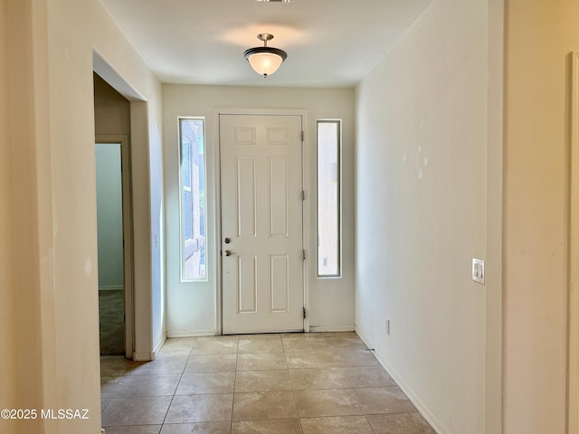 8361 N Mountain Stone Pine Way, Tucson, AZ 85743 - entrance foyer featuring healthy amount of natural light and light tile patterned floors