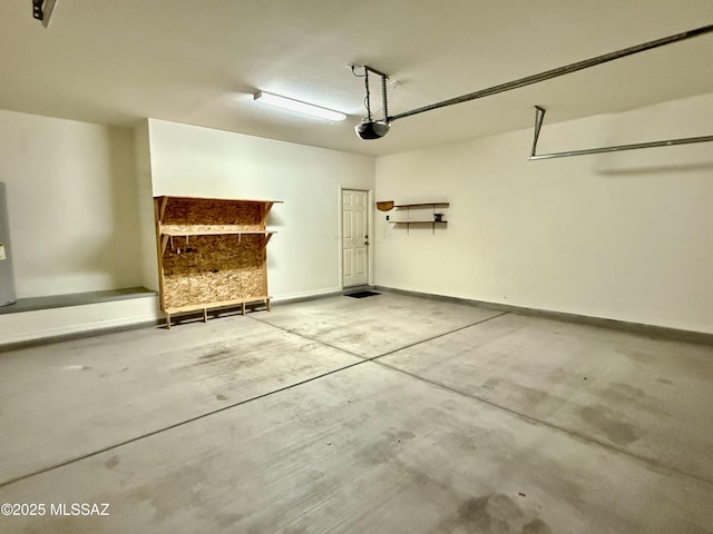 8361 N Mountain Stone Pine Way, Tucson, AZ 85743 - garage with a garage door opener and baseboards