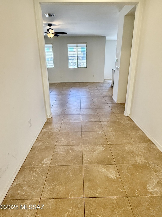 8361 N Mountain Stone Pine Way, Tucson, AZ 85743 - hallway featuring tile patterned floors and baseboards