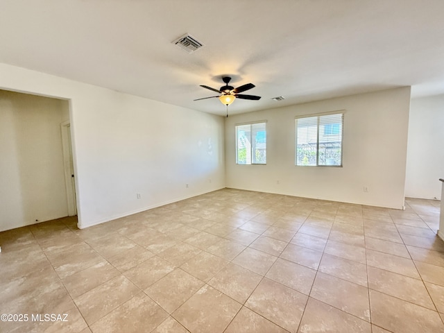 8361 N Mountain Stone Pine Way, Tucson, AZ 85743 - empty room featuring light tile patterned floors and ceiling fan