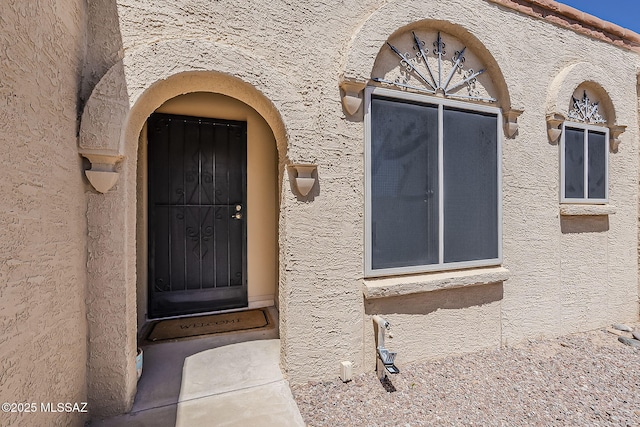 9453 E Calle Bolivar, Tucson, AZ 85715 - doorway to property with stucco siding