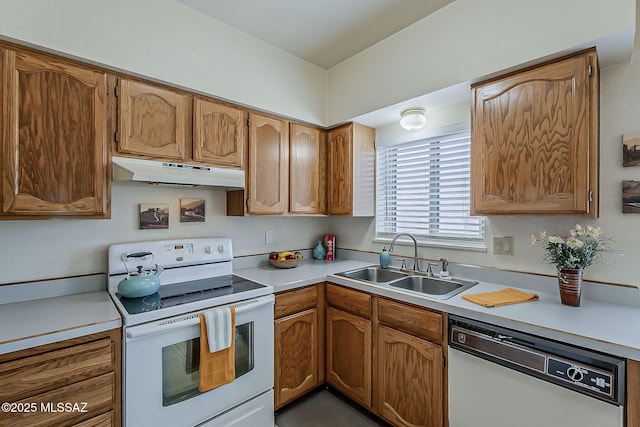 9453 E Calle Bolivar, Tucson, AZ 85715 - kitchen featuring white appliances, under cabinet range hood, light countertops, and brown cabinetry