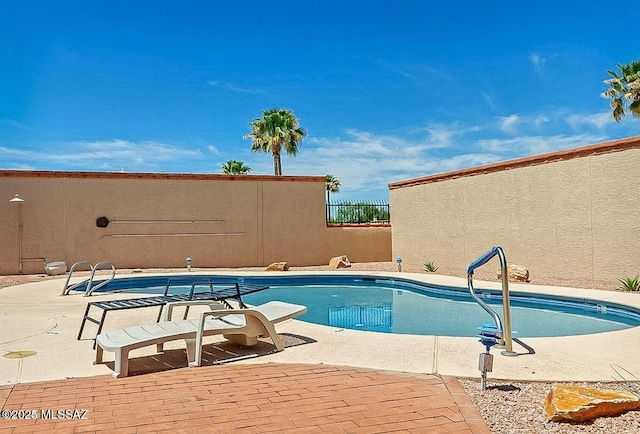 9453 E Calle Bolivar, Tucson, AZ 85715 - view of swimming pool featuring a patio area