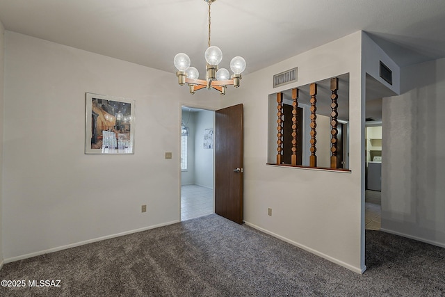 9453 E Calle Bolivar, Tucson, AZ 85715 - spare room featuring a chandelier and carpet