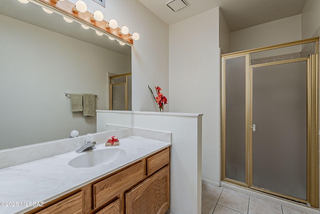 9453 E Calle Bolivar, Tucson, AZ 85715 - full bathroom with tile patterned flooring, vanity, and a shower stall