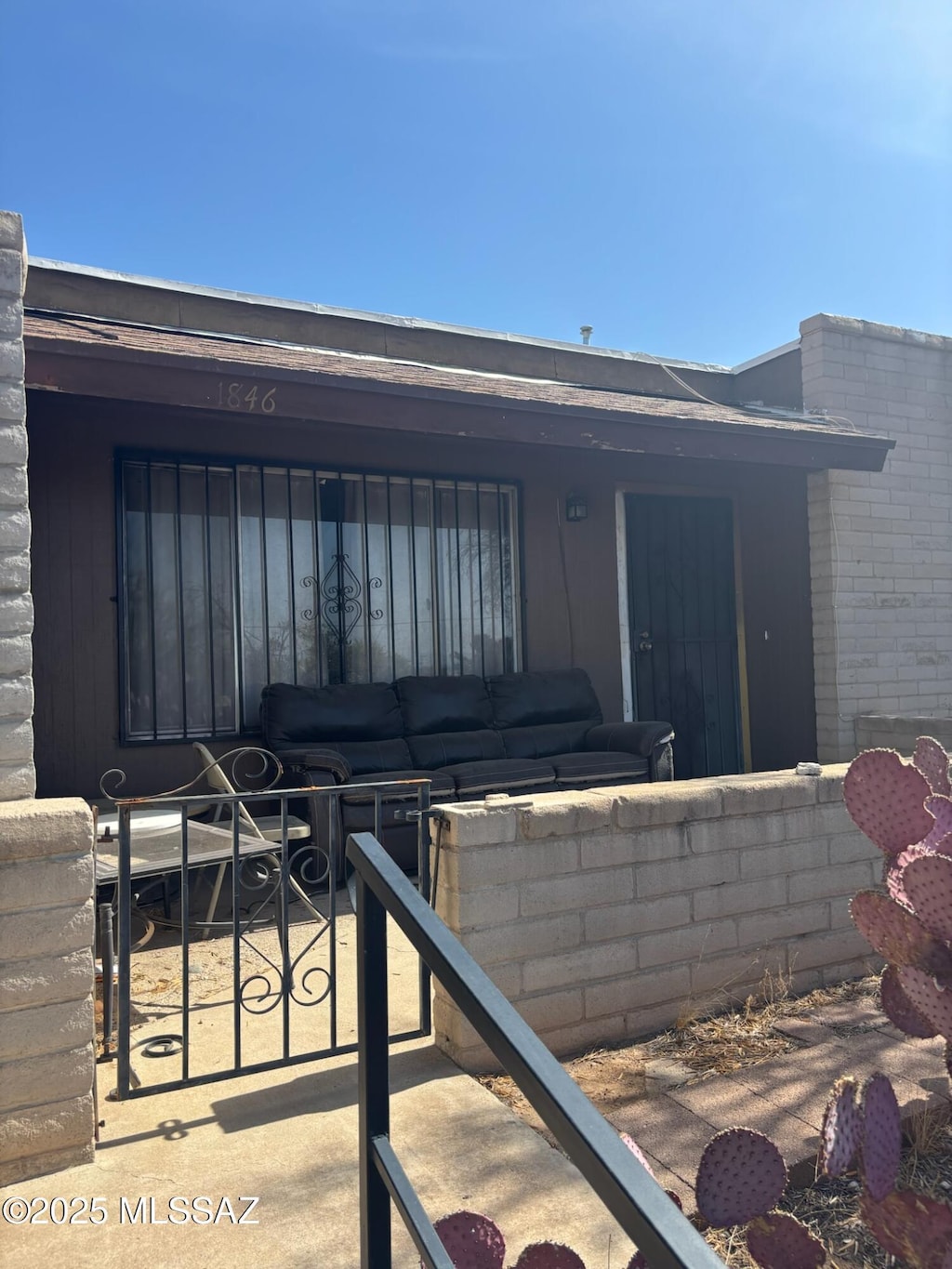 1846 W Caravelle Rd, Tucson, AZ 85713 - rear view of house featuring outdoor lounge area