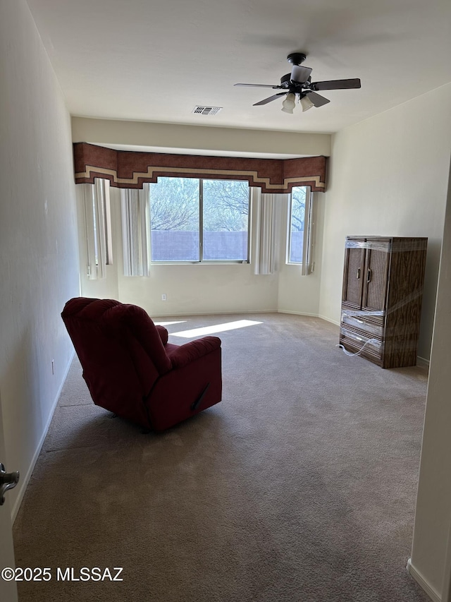 13049 N Woosnam Way, Oro Valley, AZ 85755 - carpeted living area featuring ceiling fan