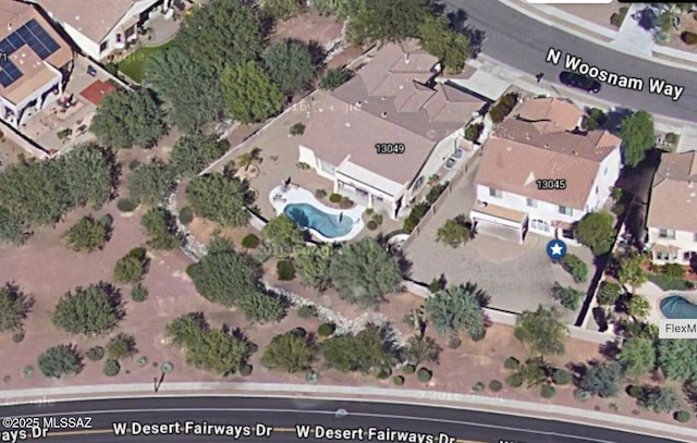 13049 N Woosnam Way, Oro Valley, AZ 85755 - aerial view of property and surrounding area with nearby suburban area