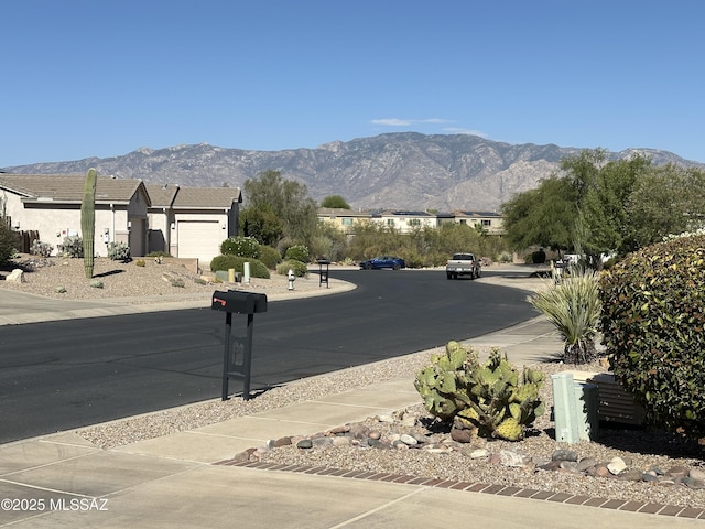13049 N Woosnam Way, Oro Valley, AZ 85755 - view of asphalt road featuring a mountain view