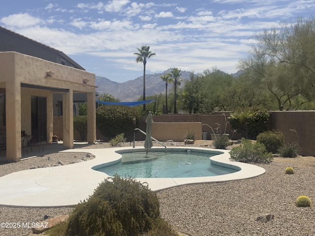 13049 N Woosnam Way, Oro Valley, AZ 85755 - view of pool featuring a mountain view, a fenced backyard, and a patio area