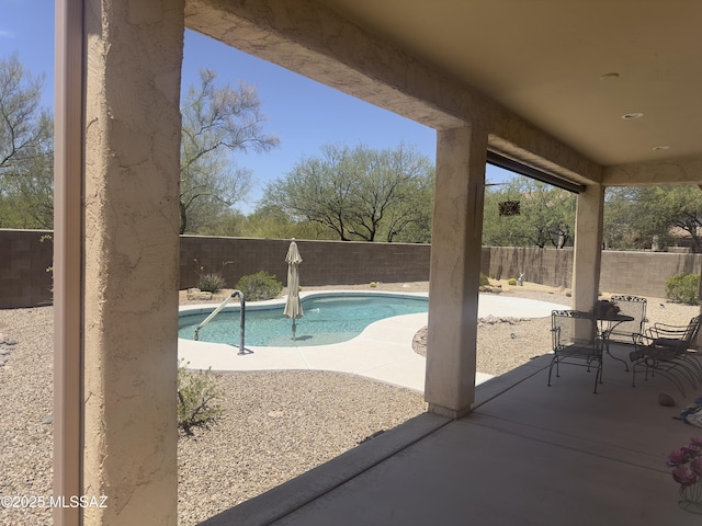 13049 N Woosnam Way, Oro Valley, AZ 85755 - view of swimming pool with a patio and a fenced backyard