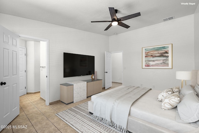 446 Soda Ln, Rio Rico, AZ 85648 - bedroom featuring light tile patterned floors and ceiling fan