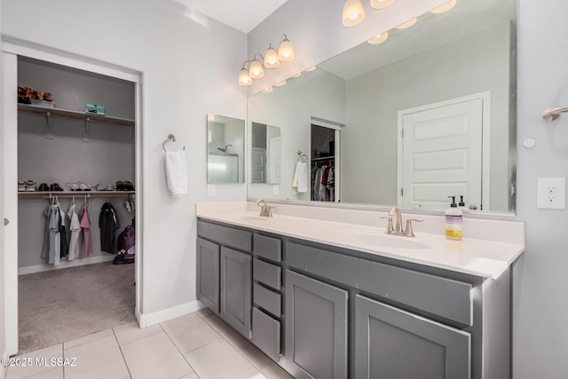 276 W Charles L Mckay St, Vail, AZ 85641 - bathroom with double vanity, a walk in closet, and tile patterned flooring