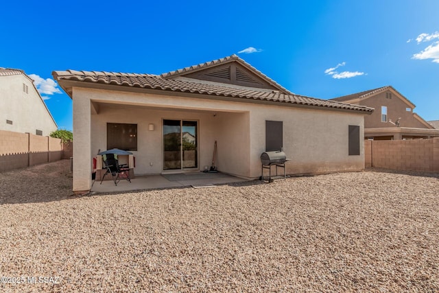 276 W Charles L Mckay St, Vail, AZ 85641 - rear view of property featuring stucco siding, a tiled roof, a patio, and a fenced backyard