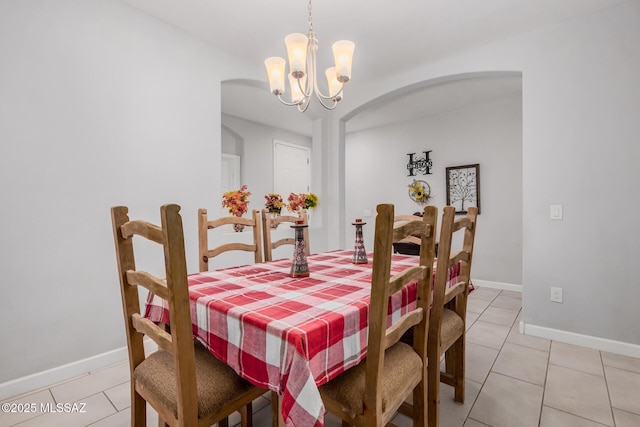 276 W Charles L Mckay St, Vail, AZ 85641 - dining space with a chandelier, light tile patterned floors, and arched walkways