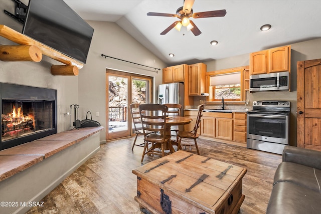 11101 E Miami St, Mount Lemmon, AZ 85619 - living room with wood finished floors, vaulted ceiling, healthy amount of natural light, ceiling fan, and recessed lighting