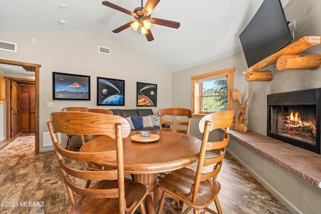11101 E Miami St, Mount Lemmon, AZ 85619 - dining area with lofted ceiling, a large fireplace, and a ceiling fan