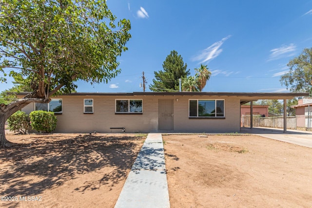 4041 E Dover Stra, Tucson, AZ 85706 - ranch-style home featuring an attached carport and concrete driveway