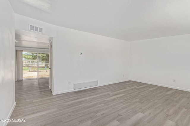 4041 E Dover Stra, Tucson, AZ 85706 - empty room with wood finished floors and baseboards