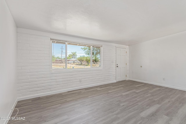 4041 E Dover Stra, Tucson, AZ 85706 - empty room with wood finished floors and baseboards