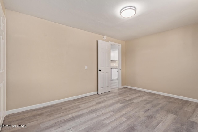 2514 N Castro Ave, Tucson, AZ 85705 - unfurnished room featuring light wood-type flooring and baseboards