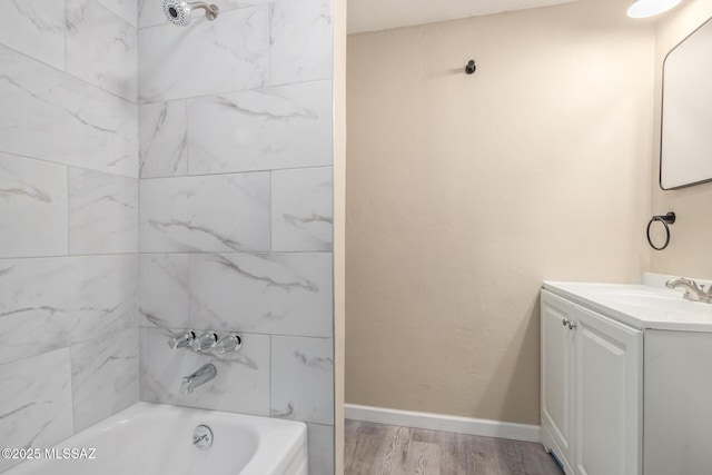 2514 N Castro Ave, Tucson, AZ 85705 - full bath with vanity, wood finished floors, and bathtub / shower combination