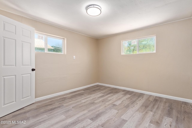 2514 N Castro Ave, Tucson, AZ 85705 - unfurnished room with plenty of natural light and light wood finished floors