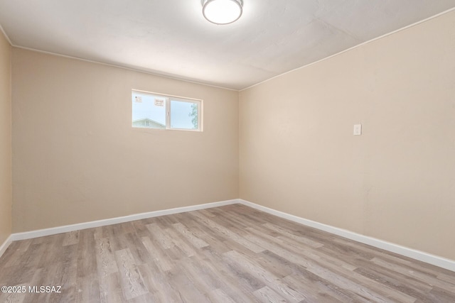 2514 N Castro Ave, Tucson, AZ 85705 - empty room with light wood-type flooring and baseboards