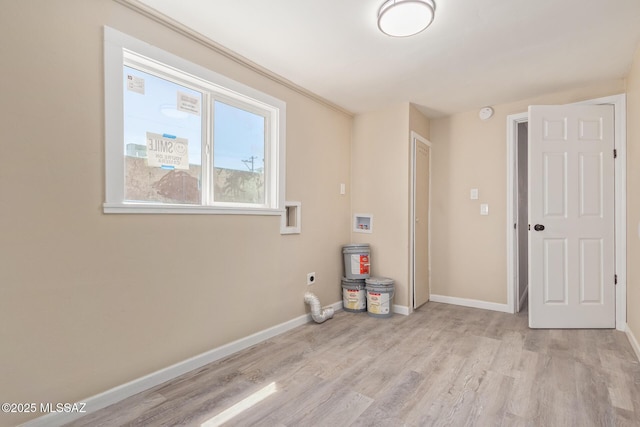2514 N Castro Ave, Tucson, AZ 85705 - laundry room with electric dryer hookup, hookup for a washing machine, and light wood-style floors