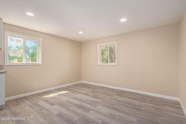 2514 N Castro Ave, Tucson, AZ 85705 - unfurnished room featuring light wood-style flooring and recessed lighting