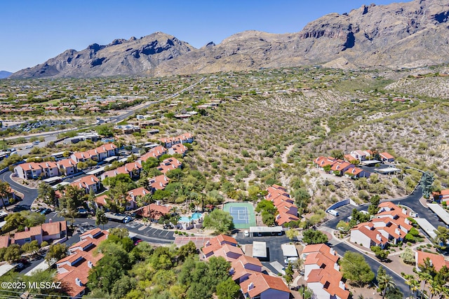 6490 N Tierra De Las Catalinas Unit 94, Tucson, AZ 85718 - aerial view of property and surrounding area featuring a mountainous background and nearby suburban area