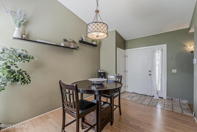6490 N Tierra De Las Catalinas Unit 94, Tucson, AZ 85718 - dining space with wood finished floors