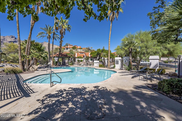 6490 N Tierra De Las Catalinas Unit 94, Tucson, AZ 85718 - community pool featuring a patio area