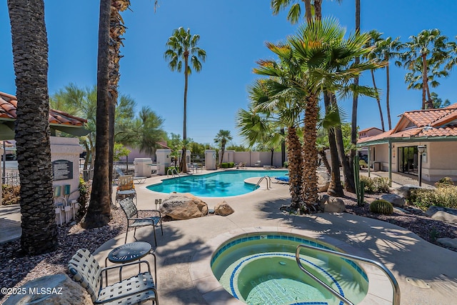 6490 N Tierra De Las Catalinas Unit 94, Tucson, AZ 85718 - community pool featuring a hot tub and a patio