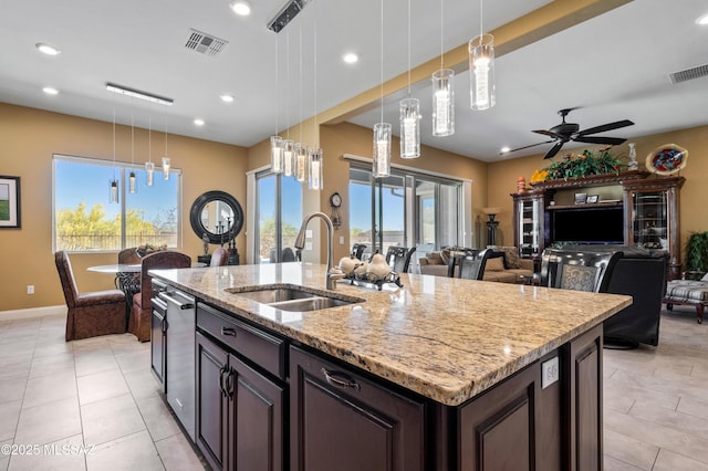 14326 Whitehorn Pl, Marana, AZ 85658 - kitchen featuring a ceiling fan, an island with sink, recessed lighting, hanging light fixtures, and light tile patterned floors