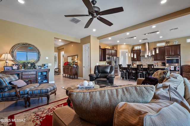 14326 Whitehorn Pl, Marana, AZ 85658 - living room featuring light tile patterned flooring, a ceiling fan, and recessed lighting