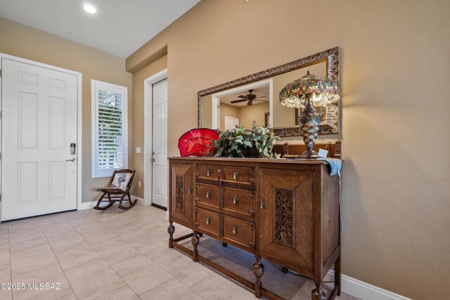 14326 Whitehorn Pl, Marana, AZ 85658 - foyer entrance with light tile patterned floors and ceiling fan