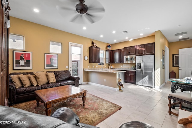 14326 Whitehorn Pl, Marana, AZ 85658 - living area with a ceiling fan, light tile patterned floors, and recessed lighting