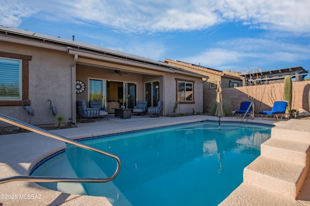 14326 Whitehorn Pl, Marana, AZ 85658 - view of pool featuring a patio area, ceiling fan, and an outdoor living space