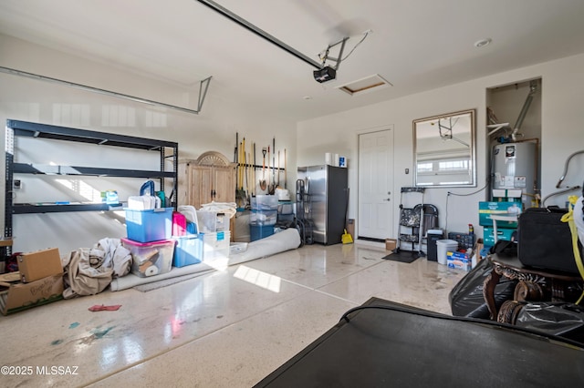 14326 Whitehorn Pl, Marana, AZ 85658 - garage featuring water heater, freestanding refrigerator, and a garage door opener