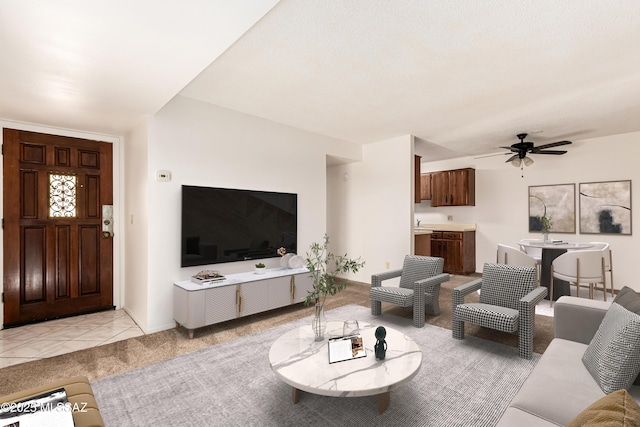 6635 E Golf Links Rd Apt 1, Tucson, AZ 85730 - living room with ceiling fan and light colored carpet