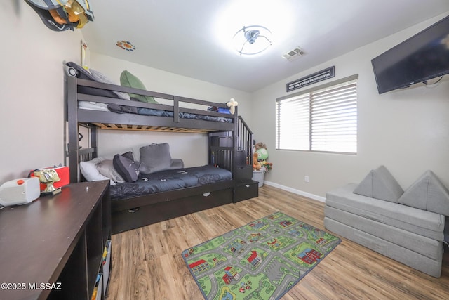 6976 Somerton Dr, Tucson, AZ 85743 - bedroom featuring wood finished floors