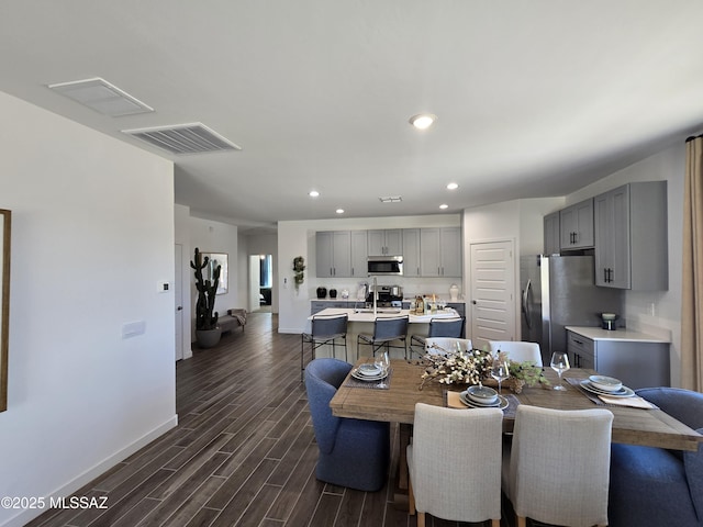 14147 E Canidae Dr E, Vail, AZ 85641 - dining room with recessed lighting and dark wood-type flooring