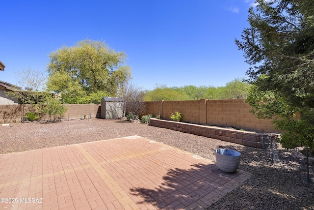 9438 N Weather Hill Dr, Tucson, AZ 85743 - fenced backyard with a patio area and a shed