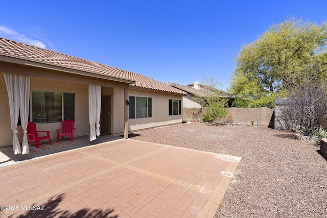 9438 N Weather Hill Dr, Tucson, AZ 85743 - fenced backyard with a patio